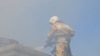 UKRAINE - the fireman extinguishes the house, 12Jan2019